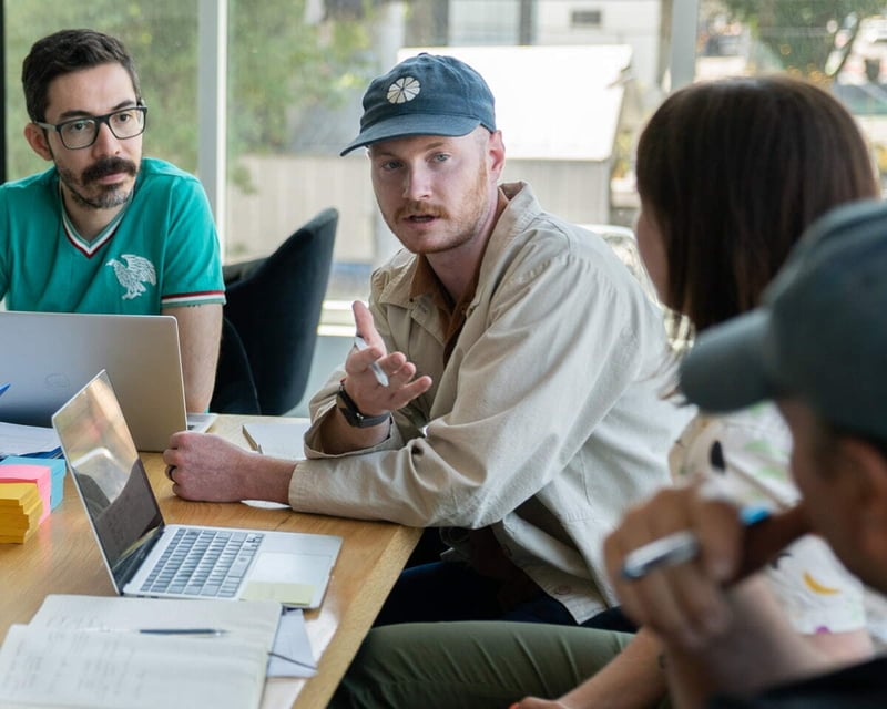 CauseMic team members in a collaborative discussion