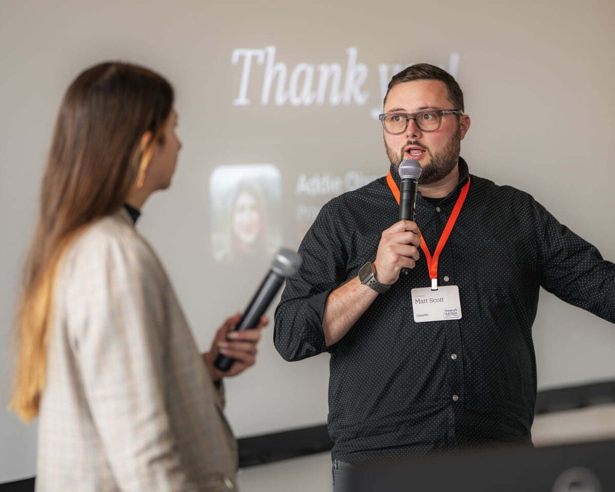 Addie and Matt speaking on AI