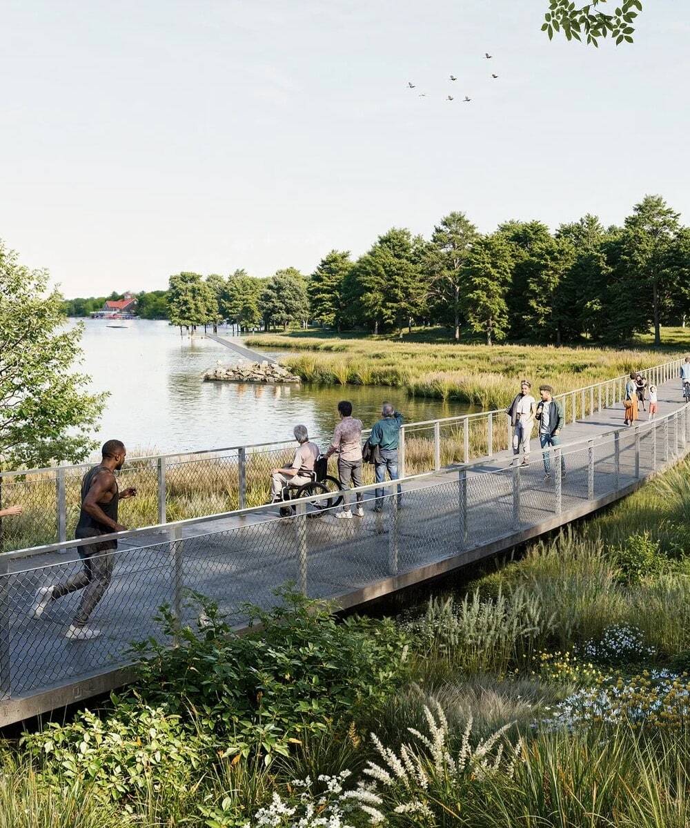 People on a pedestrian waterfront pathway