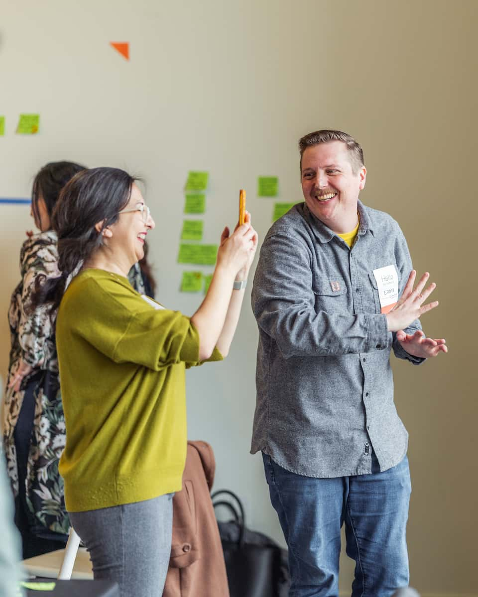 Two program participants enjoy their time at a workshop.